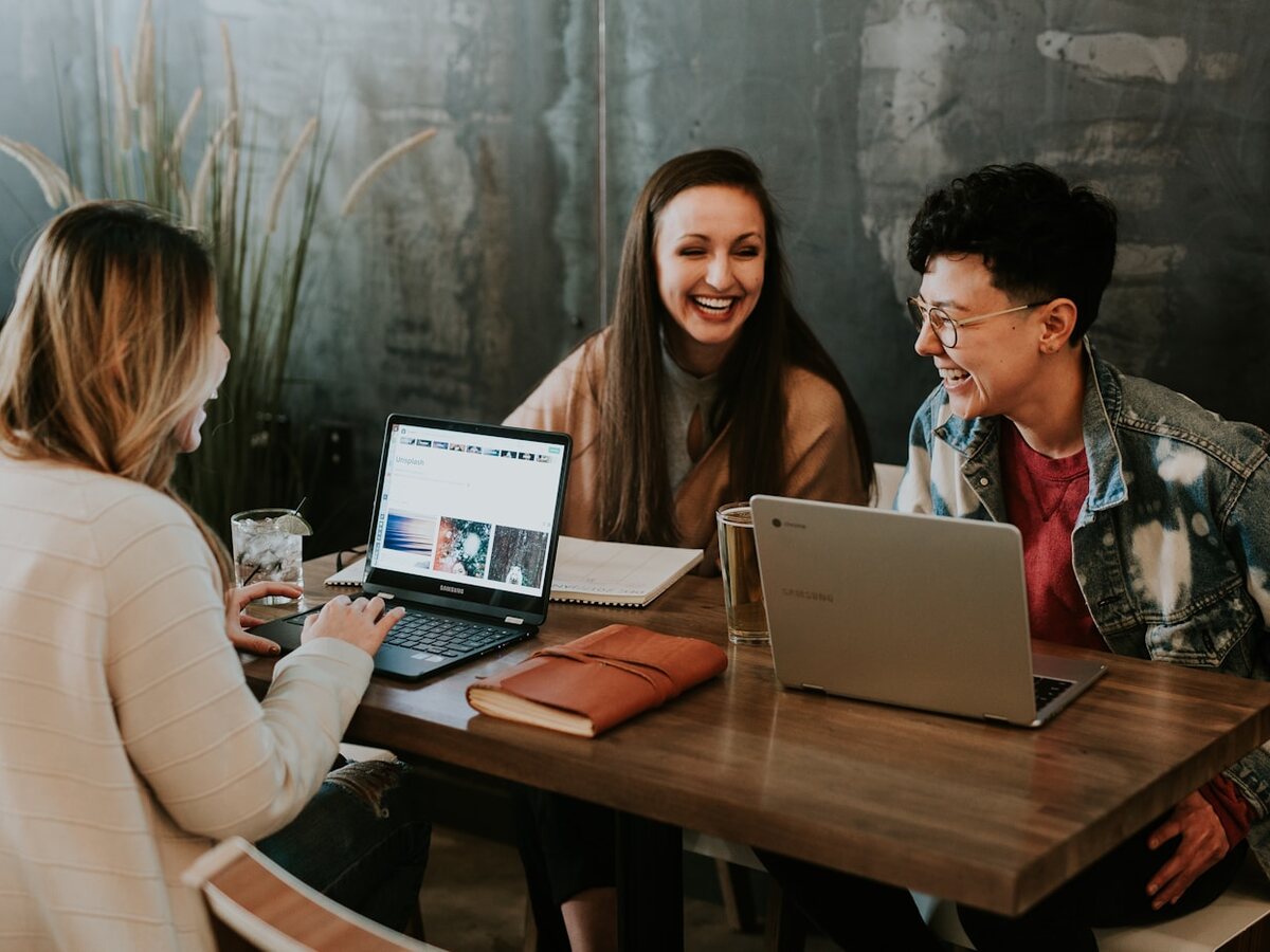 Austex colleagues collaborating in a warm, open workplace